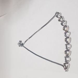 Alternating gold and silver heart bracelet